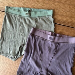 Skims green and purple briefs